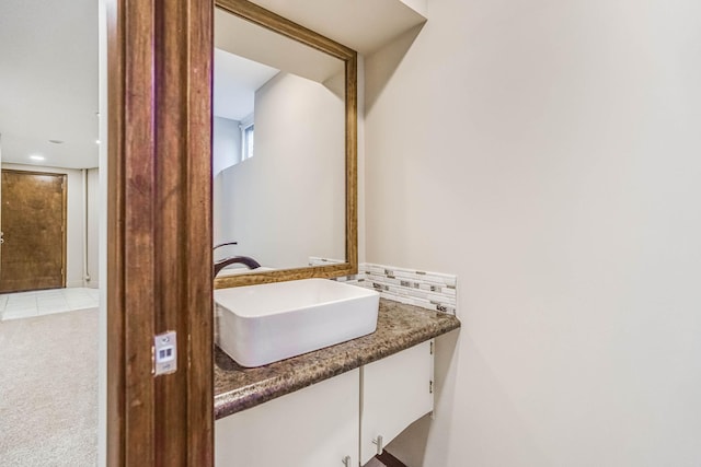 1000 Winston Cir, Mendota Heights, MN 55118 - bathroom featuring vanity, backsplash, and recessed lighting