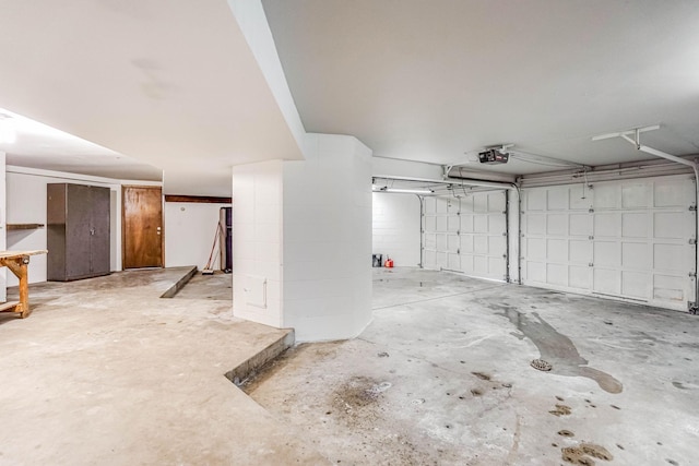 1000 Winston Cir, Mendota Heights, MN 55118 - garage featuring a garage door opener