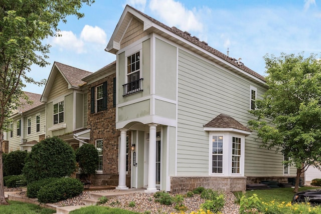 15359 Foliage Ave Unit 501, Apple Valley, MN 55124 - view of front of house with stone siding and roof with shingles