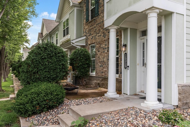 15359 Foliage Ave Unit 501, Apple Valley, MN 55124 - property entrance with brick siding and a shingled roof