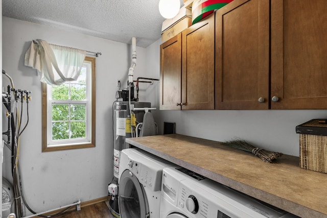 15359 Foliage Ave Unit 501, Apple Valley, MN 55124 - laundry area featuring cabinet space, separate washer and dryer, dark wood-type flooring, a textured ceiling, and water heater