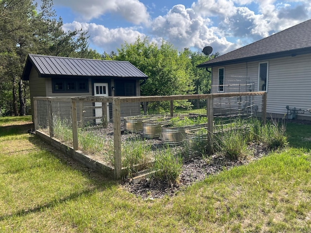 6563 Parkview Cir, Baxter, MN 56425 - view of outdoor structure with a vegetable garden