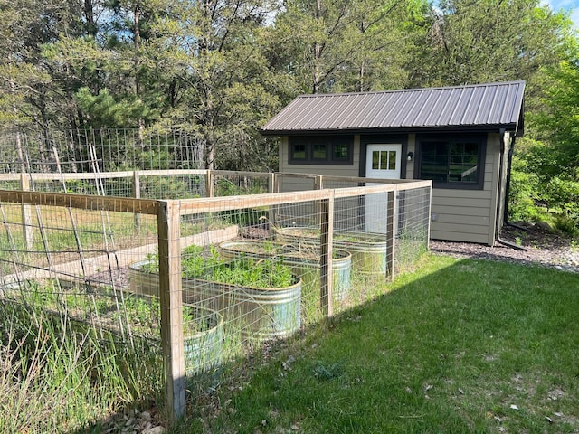 6563 Parkview Cir, Baxter, MN 56425 - view of outbuilding with a vegetable garden