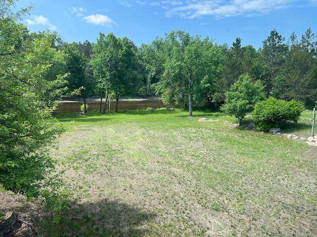6563 Parkview Cir, Baxter, MN 56425 - view of green lawn featuring a water view