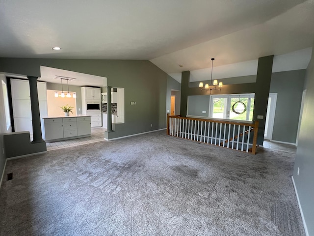 6563 Parkview Cir, Baxter, MN 56425 - unfurnished living room featuring a chandelier, baseboards, light carpet, and high vaulted ceiling