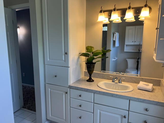 6563 Parkview Cir, Baxter, MN 56425 - bathroom featuring toilet, vanity, and tile patterned floors