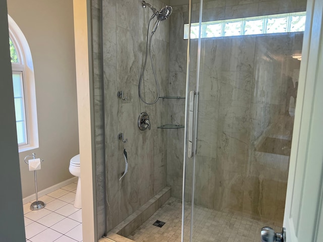 6563 Parkview Cir, Baxter, MN 56425 - bathroom with toilet, a stall shower, and tile patterned floors