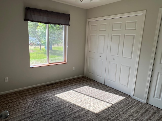 6563 Parkview Cir, Baxter, MN 56425 - unfurnished bedroom featuring carpet floors, a closet, and baseboards