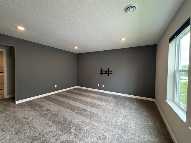 5022 Useppa Trl, Woodbury, MN 55129 - carpeted spare room with a textured ceiling, recessed lighting, and baseboards
