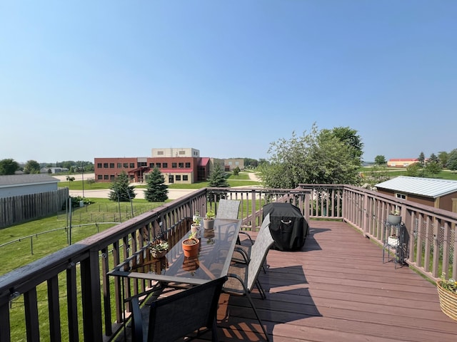 823 4th St NE, Byron, MN 55920 - wooden deck with a grill and outdoor dining space