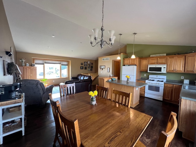 823 4th St NE, Byron, MN 55920 - dining space featuring dark wood-style floors, vaulted ceiling, and a chandelier