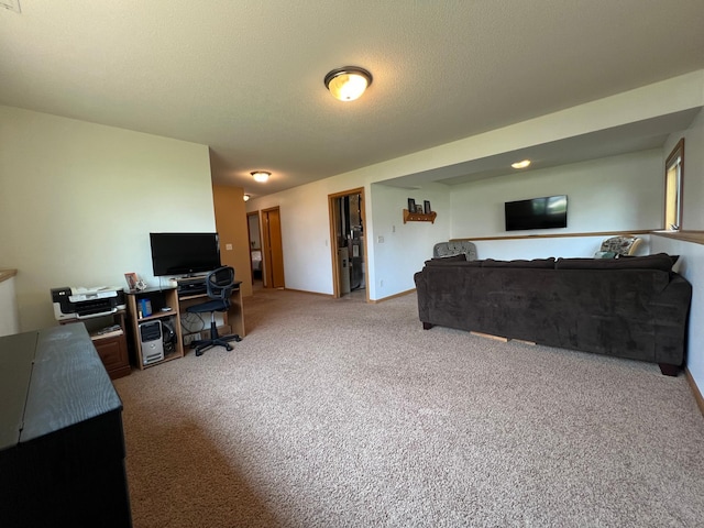 823 4th St NE, Byron, MN 55920 - living room featuring carpet flooring, a desk, and baseboards