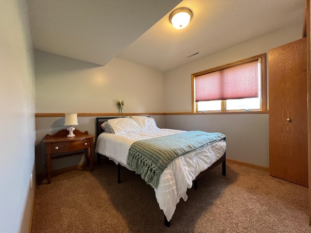 823 4th St NE, Byron, MN 55920 - carpeted bedroom featuring baseboards