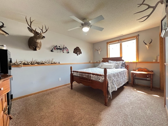 823 4th St NE, Byron, MN 55920 - carpeted bedroom with a textured ceiling and ceiling fan