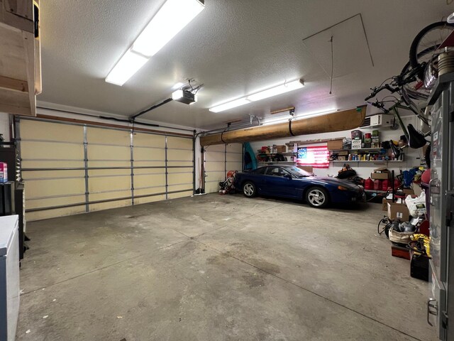 823 4th St NE, Byron, MN 55920 - garage with a garage door opener