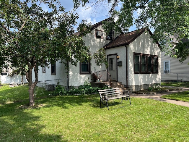 4121 2nd St NE, Columbia Heights, MN 55421 - view of front facade featuring stucco siding