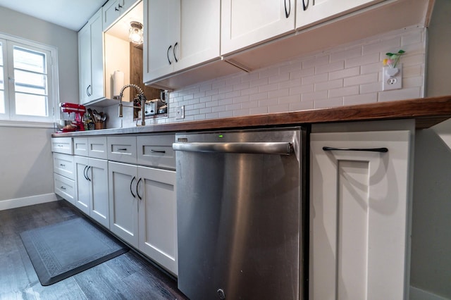 327 Channing Ave, Fergus Falls, MN 56537 - kitchen featuring stainless steel dishwasher, backsplash, baseboards, dark wood finished floors, and white cabinets