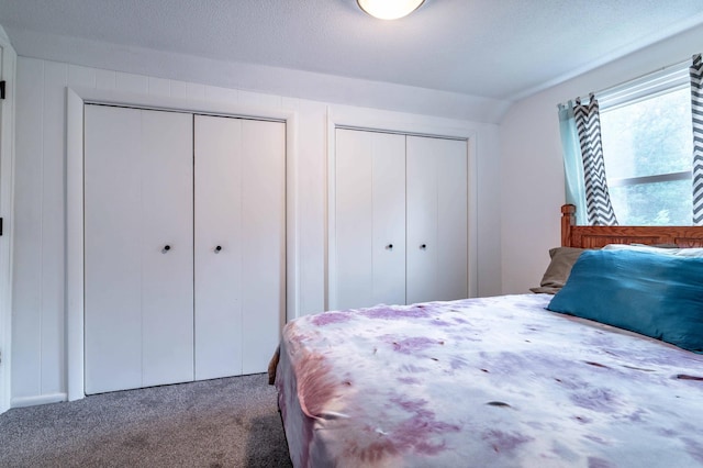 327 Channing Ave, Fergus Falls, MN 56537 - carpeted bedroom featuring multiple closets