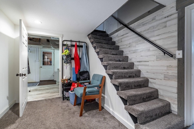 327 Channing Ave, Fergus Falls, MN 56537 - stairs featuring carpet floors and baseboards