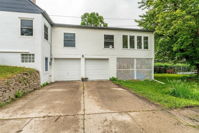 327 Channing Ave, Fergus Falls, MN 56537 - view of front of house featuring a garage and concrete driveway