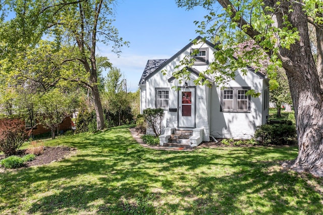 3017 32nd Ave NE, Saint Anthony, MN 55418 - tudor house with a front lawn