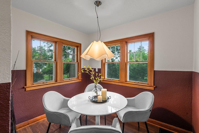 3017 32nd Ave NE, Saint Anthony, MN 55418 - dining space with wood finished floors and a textured wall