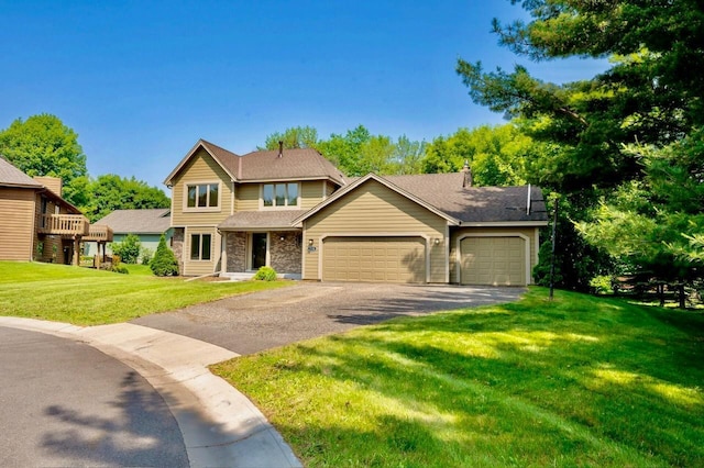 7158 Deerwood Ln N, Maple Grove, MN 55369 - traditional home with a garage, asphalt driveway, a front yard, and a shingled roof