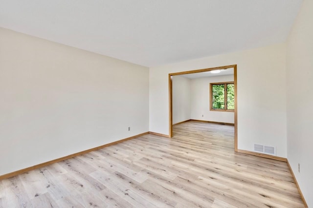 7158 Deerwood Ln N, Maple Grove, MN 55369 - empty room with light wood-type flooring and baseboards