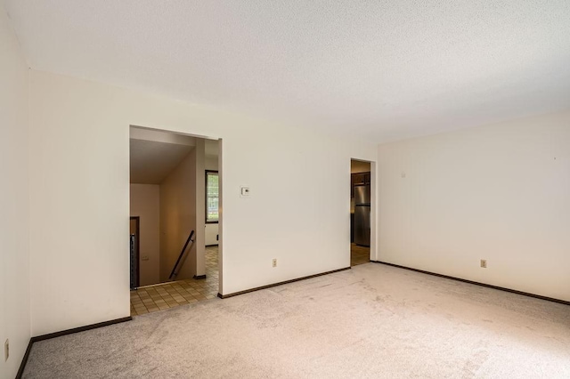 10465 Osage St NW, Coon Rapids, MN 55433 - unfurnished room with light colored carpet and baseboards