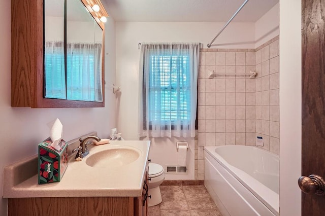 10465 Osage St NW, Coon Rapids, MN 55433 - full bathroom featuring healthy amount of natural light, vanity, shower / bath combination, and tile patterned floors