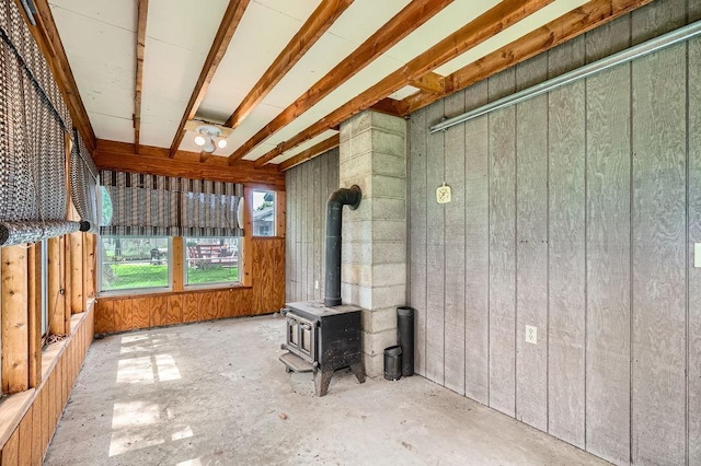 10465 Osage St NW, Coon Rapids, MN 55433 - unfurnished sunroom with a wood stove