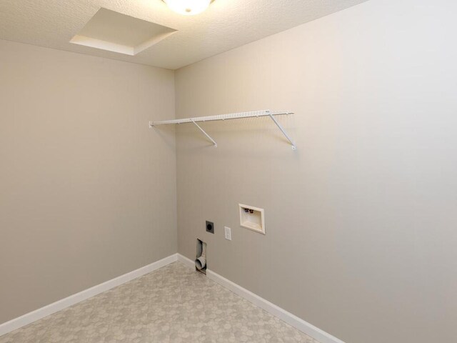 3235 Jandura Ave NE, Saint Michael, MN 55376 - laundry room with electric dryer hookup, washer hookup, light floors, and a textured ceiling