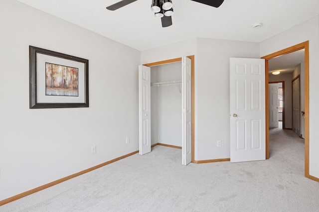 10612 172nd Ln NW, Elk River, MN 55330 - unfurnished bedroom featuring light carpet, baseboards, a closet, and a ceiling fan