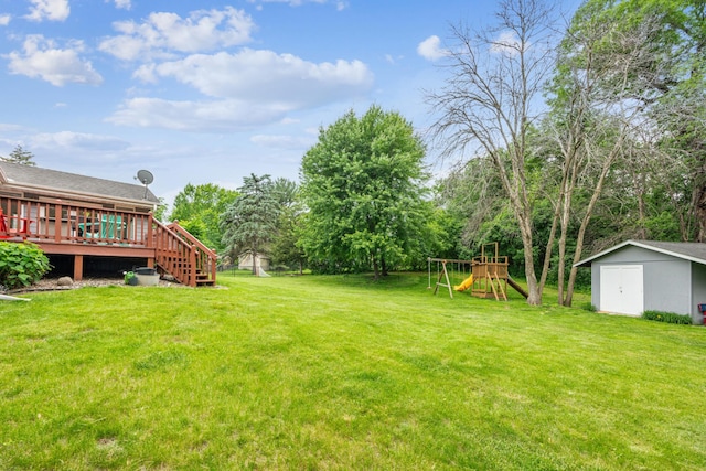 11788 65th Pl N, Maple Grove, MN 55369 - view of grassy yard with a playground, a deck, stairway, and view of scattered trees