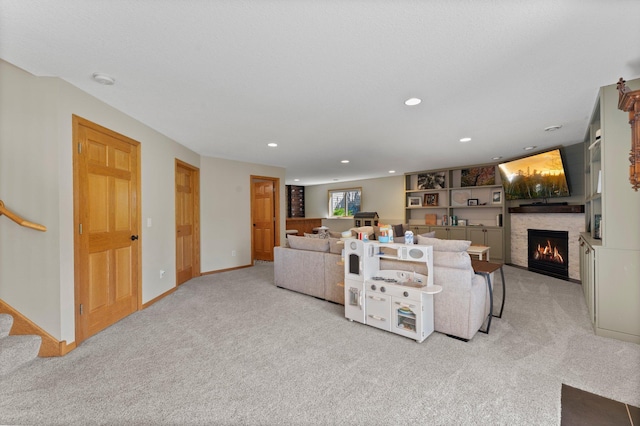 2554 160th Ave NE, Ham Lake, MN 55304 - living room featuring light carpet, a fireplace, stairway, recessed lighting, and baseboards