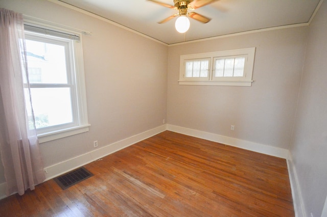 1331 1st St SE, Rochester, MN 55904 - unfurnished room with crown molding, ceiling fan, baseboards, and hardwood / wood-style flooring