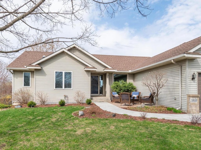 16850 Willowwood Cir SE, Prior Lake, MN 55372 - single story home featuring roof with shingles, a front yard, and a patio