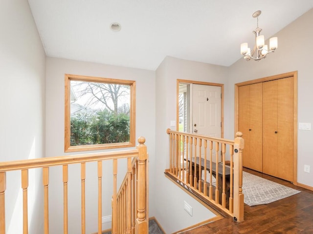 16850 Willowwood Cir SE, Prior Lake, MN 55372 - entryway featuring a chandelier, wood finished floors, and baseboards