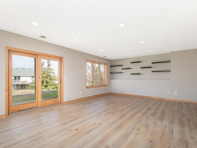 16850 Willowwood Cir SE, Prior Lake, MN 55372 - empty room with light wood-style floors, baseboards, and recessed lighting