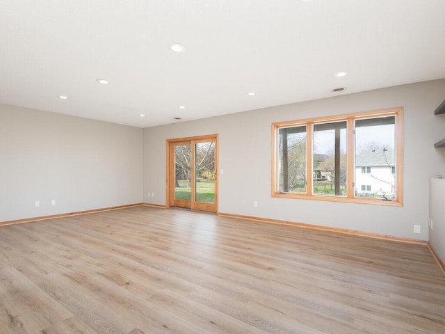 16850 Willowwood Cir SE, Prior Lake, MN 55372 - unfurnished room featuring recessed lighting, light wood-type flooring, and baseboards
