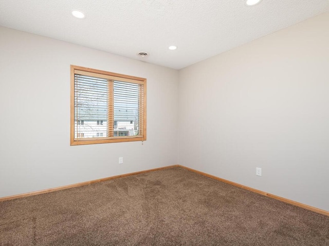 16850 Willowwood Cir SE, Prior Lake, MN 55372 - unfurnished room featuring carpet floors, baseboards, and recessed lighting