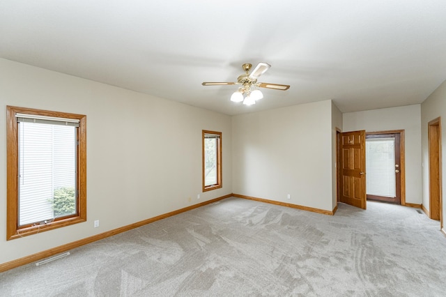 2310 Wilshire Ln NE, Rochester, MN 55906 - empty room with baseboards, light carpet, and a ceiling fan