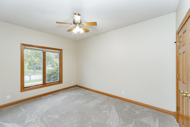 2310 Wilshire Ln NE, Rochester, MN 55906 - empty room with baseboards, light colored carpet, and ceiling fan