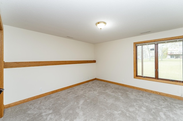 2310 Wilshire Ln NE, Rochester, MN 55906 - carpeted spare room with baseboards