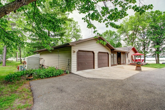 14070 County 18, Park Rapids, MN 56470 - view of front of property with driveway and a garage