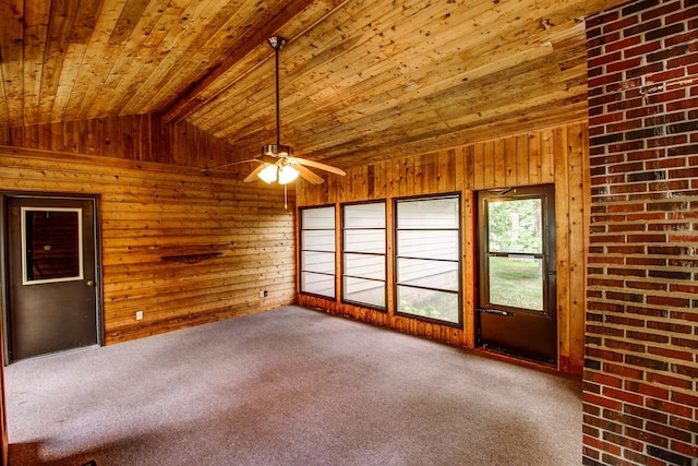 14070 County 18, Park Rapids, MN 56470 - carpeted spare room featuring lofted ceiling, wood walls, a ceiling fan, and wood ceiling