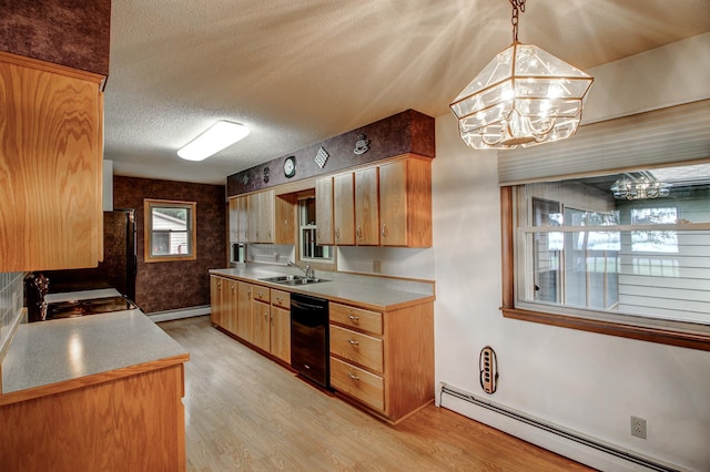 14070 County 18, Park Rapids, MN 56470 - kitchen with a chandelier, black dishwasher, baseboard heating, light wood finished floors, and a sink