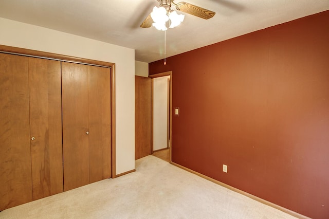 14070 County 18, Park Rapids, MN 56470 - unfurnished bedroom with a closet, carpet, a ceiling fan, and baseboards