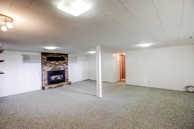 14070 County 18, Park Rapids, MN 56470 - finished basement featuring a brick fireplace, carpet flooring, and baseboards