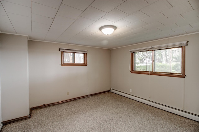 14070 County 18, Park Rapids, MN 56470 - unfurnished room with a baseboard heating unit, crown molding, carpet, and baseboards